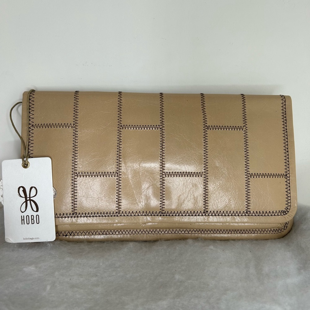 Used twice no more tags HOBO Beige Tan Patchwork Leather Clutch Wristlet